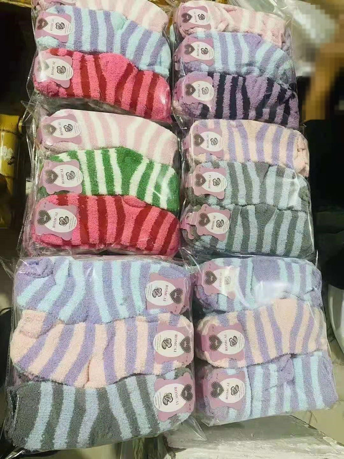 Pair of soft, warm fleece socks in various colors, wholesale dealonline.nz brand, ideal for cozy winter wear.