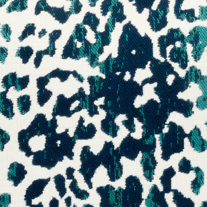 Detail image of Animal pattern in teal and dark blue pillow in lumbar size for indoor and outdoor décor.