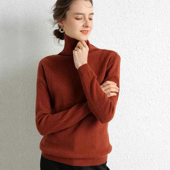 Beige women's 100% Merino wool turtleneck sweater from Mead's Supply & Equipment Outfitters, slim fit with high neck for autumn winter layering.