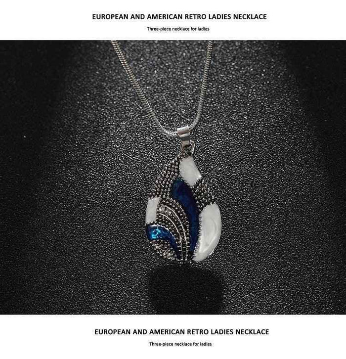 Stylish 3Sixty5 women's Ocean Mist Drop jewelry set featuring silver necklace and earrings with elegant ocean-inspired design.