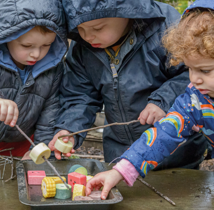 Yellow Door Sensory Play Stones – Threading Kebabs children playing